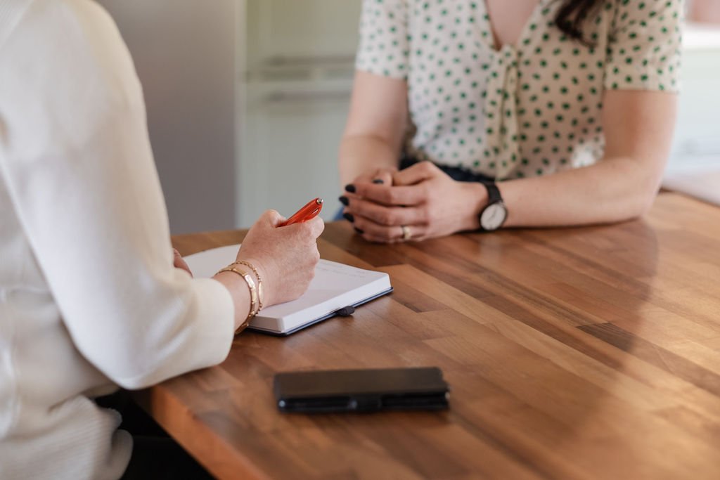 A mentoring conversation across a table